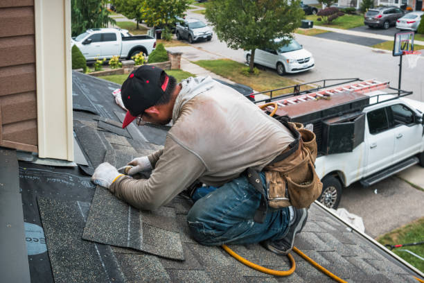 Professional Roofing technician working in Northfield, MA